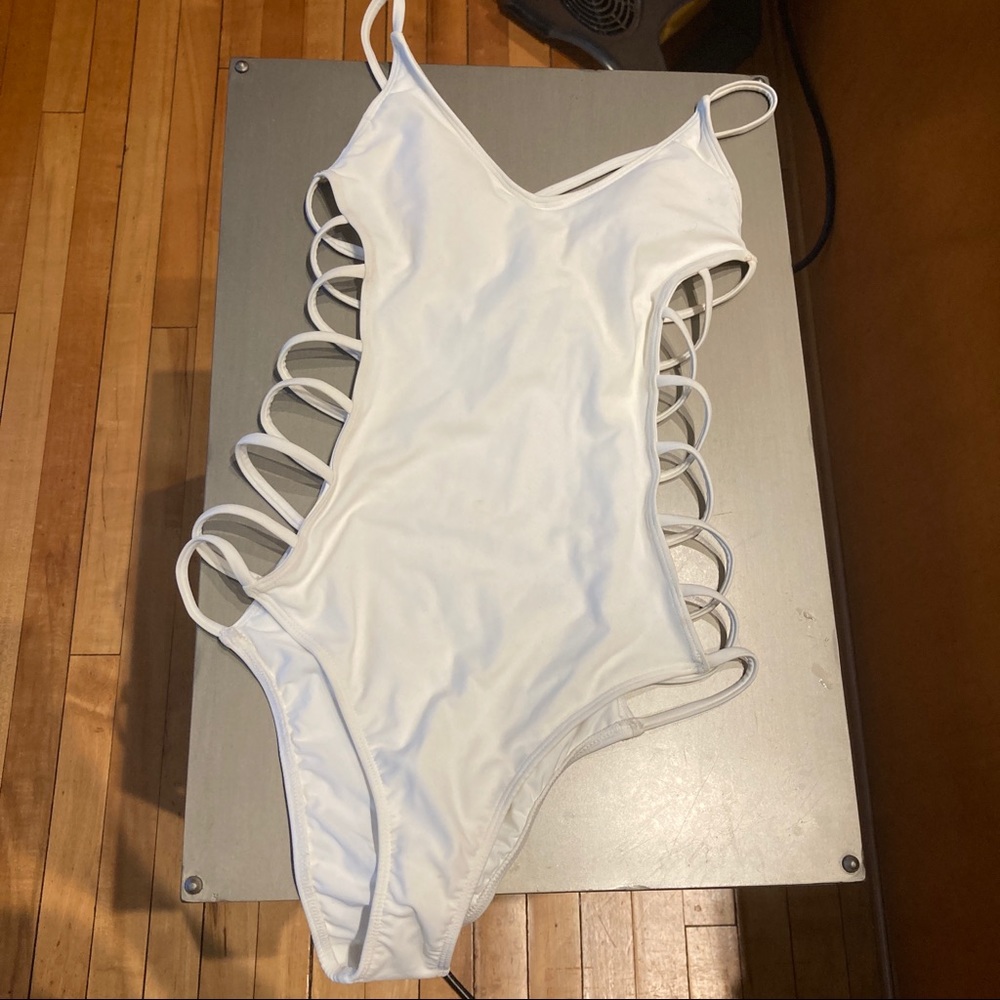 - NWT Sexy Cage Cutout One Piece
